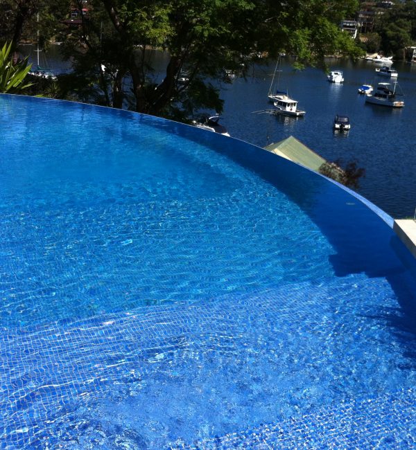 Rounded large pool, colour blending with ocean view, Caringbah South