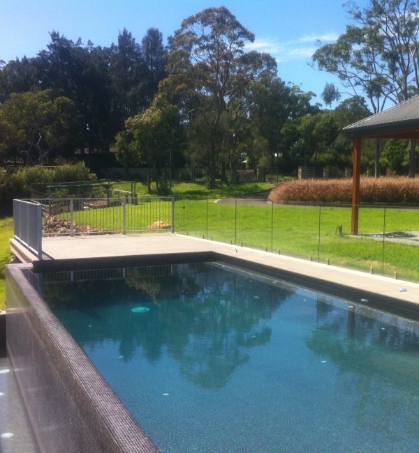 Large pool with dark colour tiles and ballast tank, Duffy Forest